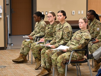 Cadets watch attentively as the Nurse Summer Training Program completion ceremony gets underway. The event marks the culmination of their 28-day clinical immersion experience.