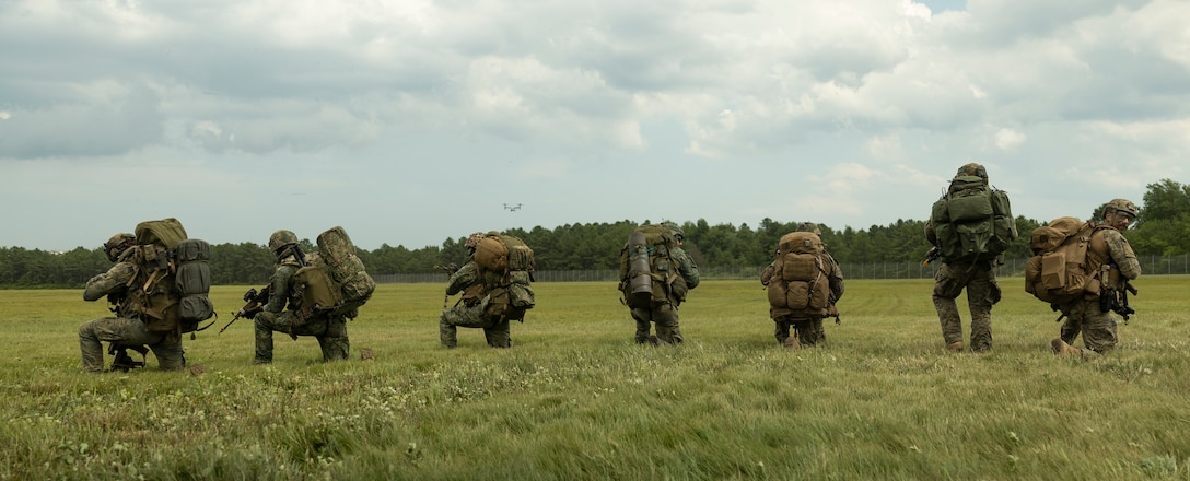 Royal Netherlands Marines disembark from an MV-22B Osprey with Marine Medium Tiltrotor Squadron (VMM) 266 at Joint Base McGuire-Dix-Lakehurst, New Jersey, June 29, 2025. II Marine Expeditionary Force and U.S. Second Fleet, along with NATO Allies from the Netherlands and the United Kingdom, are conducting Atlantic Alliance 2025 (AA25). AA25 is the premier East Coast naval integration exercise, taking place along the eastern seaboard from North Carolina to Maine and focusing on the unique amphibious capabilities offered by the Navy-Marine Corps team. (U.S. Marine Corps photo by Lance Cpl. Mya Seymour)
