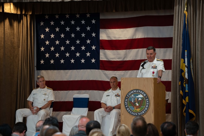 250630-N-EN156-1130 SILVERDALE, Wash. (June 30, 2025) — Rear Adm. Mark Sucato delivers remarks during a change of command ceremony held in Bangor Plaza at Naval Base Kitsap-Bangor, June 30, 2025. During the ceremony Capt. Jason Sherman relieved Sucato as commander, Navy Region Northwest. Commander, Navy Region Northwest provides consolidated base operations support for Navy activities in Washington, Oregon, Alaska, Idaho, Montana, Wyoming, North Dakota, South Dakota, Nebraska, Minnesota and Iowa. The commander oversees the assigned shore organization and provides facilities and space management, exercise coordination, and support to homeported and transient ships, submarines and aircraft as well as afloat and ashore tenants, military and family members. (U.S. Navy photo by Lt. Zachary Anderson)