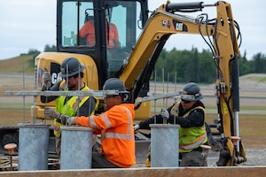The Kiewit Construction Team continues to work on the expansion of the flight-line on Joint Base Elmendorf-Richardson, Alaska, June 30. This project began in the fall of 2022 and the team continues to make great efforts to complete it. One of two on Elmendorf Field, Runway 16/34 will be extended 2,900 feet to make the length of the runway 10,000 feet and the southern threshold of the runway will shift 400 feet to the north to meet airfield design requirements. The project will also extend the two parallel taxiways; add an arm-disarm pad; upgrade the airfield lighting and the instrument landing system; re-route Airlifter Drive around the north end of the extension; relocate airfield perimeter fencing and reconfigure utility services in the area. Upon completion of the runway extension, JBER will be capable of accommodating any airframe in the Department of Defense, regardless of the weather.