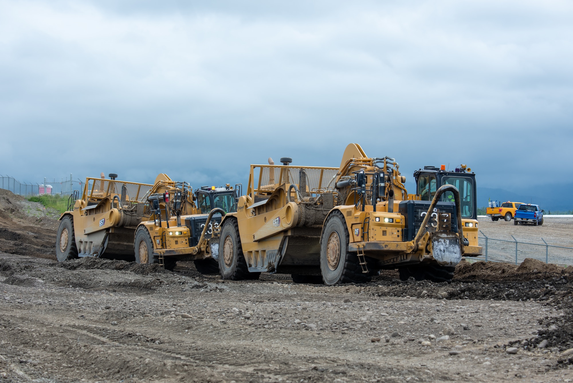 The Kiewit Construction Team continues to work on the expansion of the flight-line on Joint Base Elmendorf-Richardson, Alaska, June 30. This project began in the fall of 2022 and the team continues to make great efforts to complete it. One of two on Elmendorf Field, Runway 16/34 will be extended 2,900 feet to make the length of the runway 10,000 feet and the southern threshold of the runway will shift 400 feet to the north to meet airfield design requirements. The project will also extend the two parallel taxiways; add an arm-disarm pad; upgrade the airfield lighting and the instrument landing system; re-route Airlifter Drive around the north end of the extension; relocate airfield perimeter fencing and reconfigure utility services in the area. Upon completion of the runway extension, JBER will be capable of accommodating any airframe in the Department of Defense, regardless of the weather.