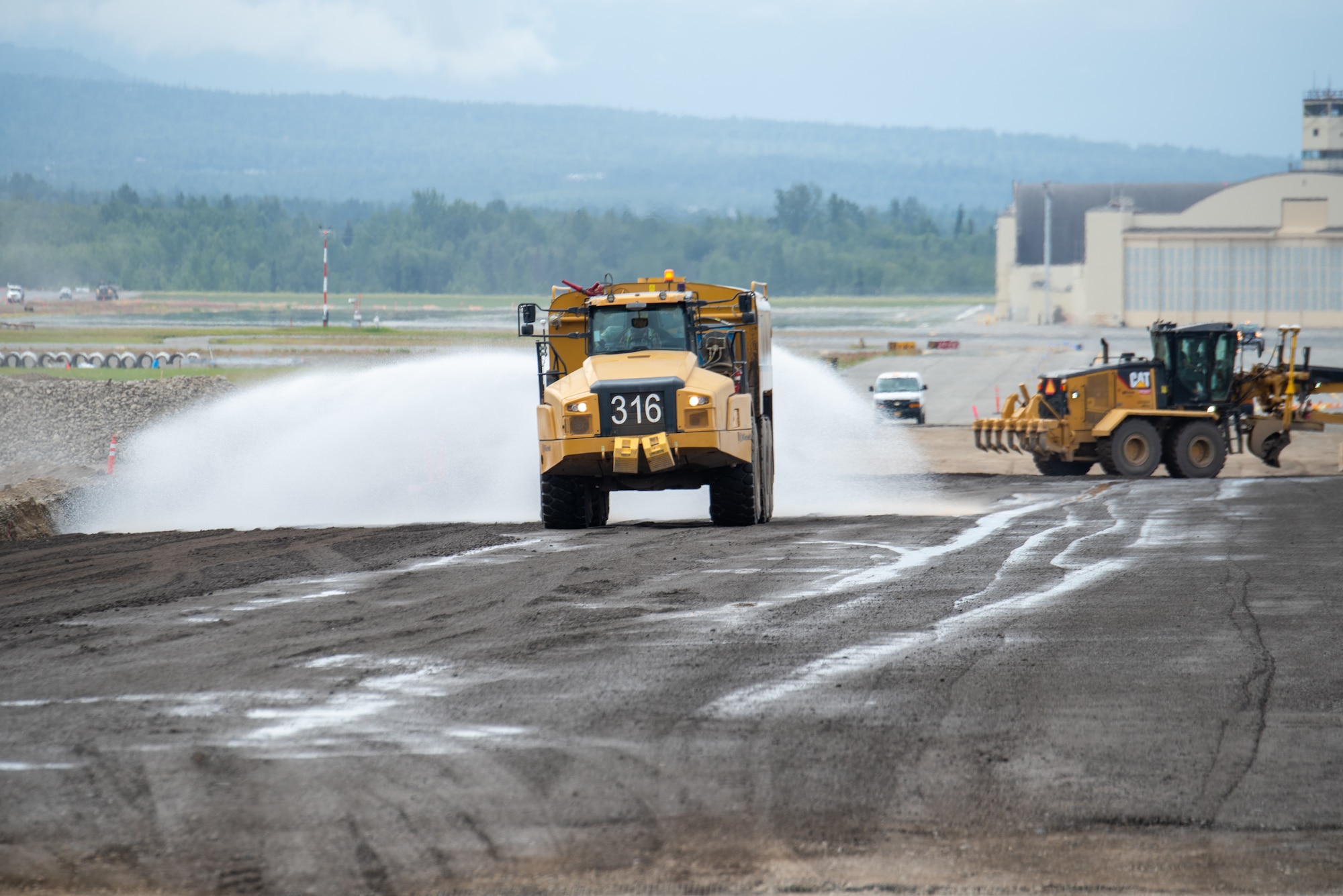 The Kiewit Construction Team continues to work on the expansion of the flight-line on Joint Base Elmendorf-Richardson, Alaska, June 30. This project began in the fall of 2022 and the team continues to make great efforts to complete it. One of two on Elmendorf Field, Runway 16/34 will be extended 2,900 feet to make the length of the runway 10,000 feet and the southern threshold of the runway will shift 400 feet to the north to meet airfield design requirements. The project will also extend the two parallel taxiways; add an arm-disarm pad; upgrade the airfield lighting and the instrument landing system; re-route Airlifter Drive around the north end of the extension; relocate airfield perimeter fencing and reconfigure utility services in the area. Upon completion of the runway extension, JBER will be capable of accommodating any airframe in the Department of Defense, regardless of the weather.
