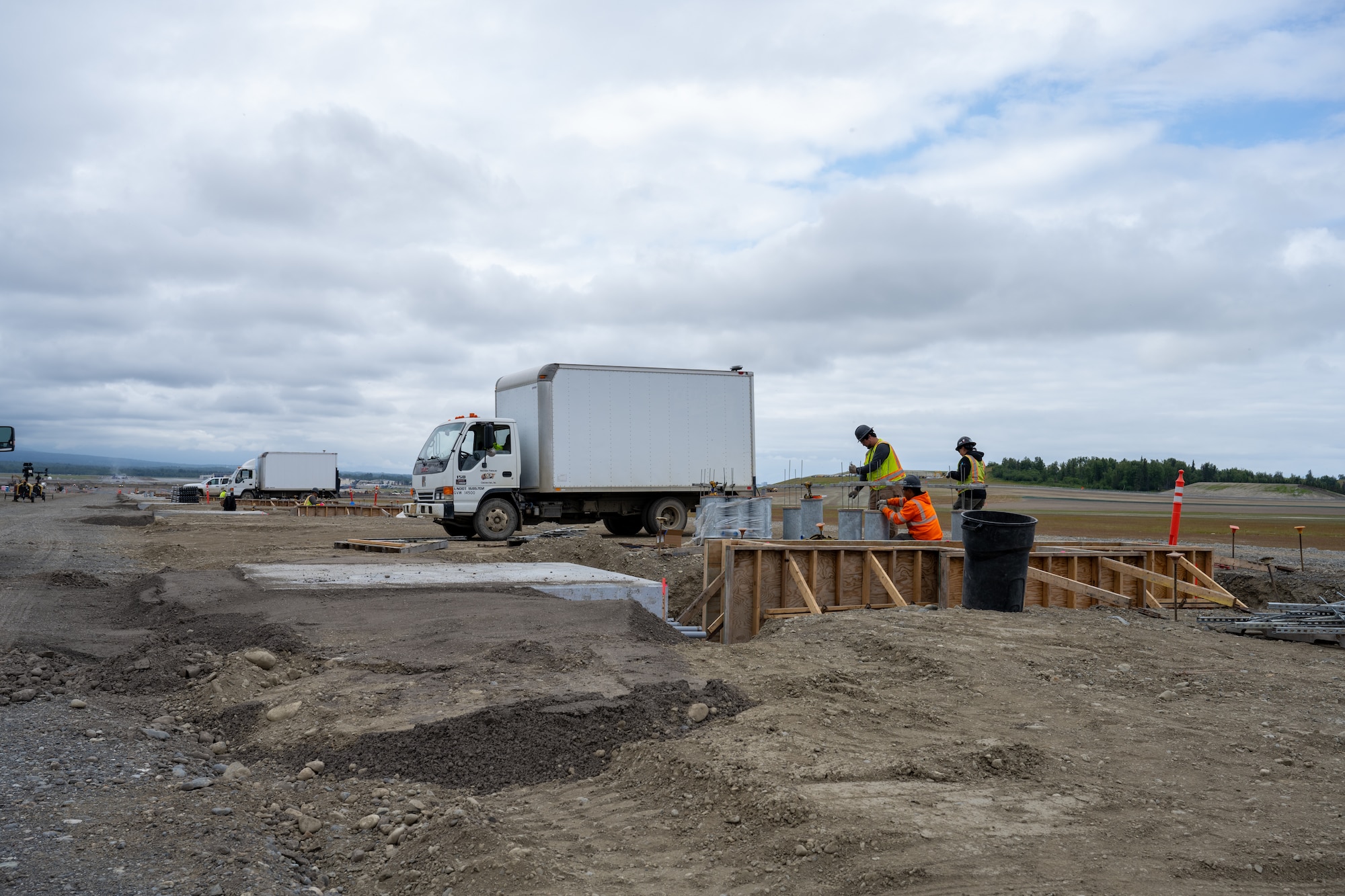 The Kiewit Construction Team continues to work on the expansion of the flight-line on Joint Base Elmendorf-Richardson, Alaska, June 30. This project began in the fall of 2022 and the team continues to make great efforts to complete it. One of two on Elmendorf Field, Runway 16/34 will be extended 2,900 feet to make the length of the runway 10,000 feet and the southern threshold of the runway will shift 400 feet to the north to meet airfield design requirements. The project will also extend the two parallel taxiways; add an arm-disarm pad; upgrade the airfield lighting and the instrument landing system; re-route Airlifter Drive around the north end of the extension; relocate airfield perimeter fencing and reconfigure utility services in the area. Upon completion of the runway extension, JBER will be capable of accommodating any airframe in the Department of Defense, regardless of the weather.