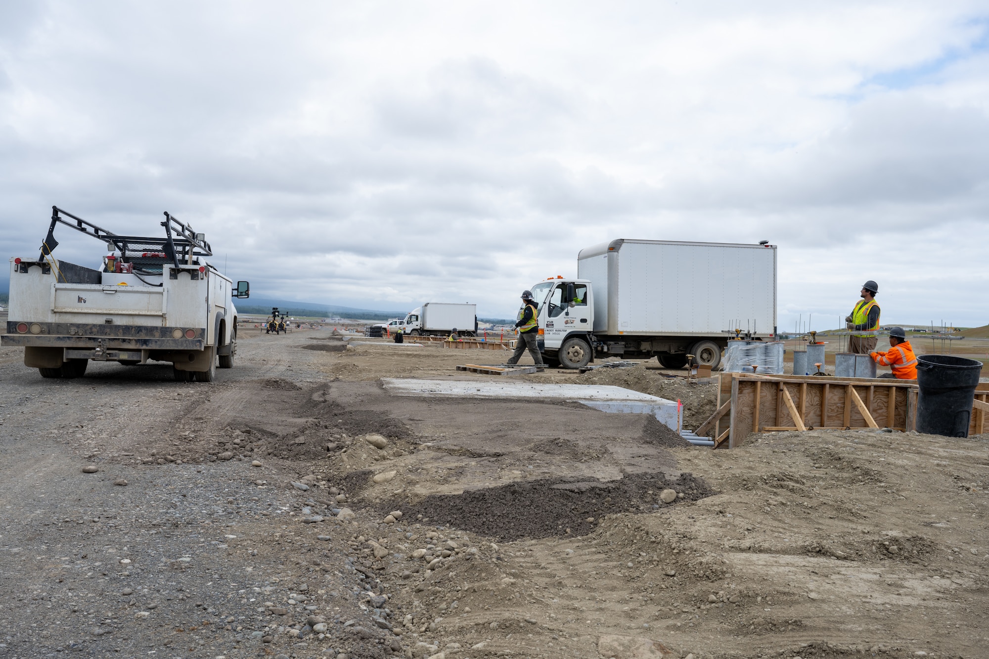 The Kiewit Construction Team continues to work on the expansion of the flight-line on Joint Base Elmendorf-Richardson, Alaska, June 30. This project began in the fall of 2022 and the team continues to make great efforts to complete it. One of two on Elmendorf Field, Runway 16/34 will be extended 2,900 feet to make the length of the runway 10,000 feet and the southern threshold of the runway will shift 400 feet to the north to meet airfield design requirements. The project will also extend the two parallel taxiways; add an arm-disarm pad; upgrade the airfield lighting and the instrument landing system; re-route Airlifter Drive around the north end of the extension; relocate airfield perimeter fencing and reconfigure utility services in the area. Upon completion of the runway extension, JBER will be capable of accommodating any airframe in the Department of Defense, regardless of the weather.