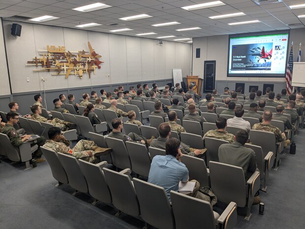 Students from 23B, 24A and the Enlisted Test Course engage with Program Office and Combined Test Force leaders during the T-7 case study. (Courtesy photo)
