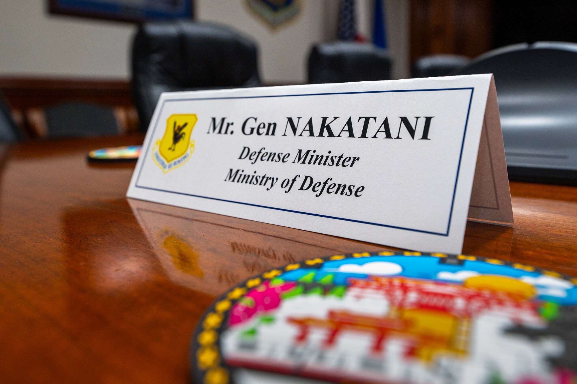 A place holder displays the name of the Honorable Gen Nakatani, Japanese Defense Minister, during his visit to Kadena Air Base, June 23, 2025.