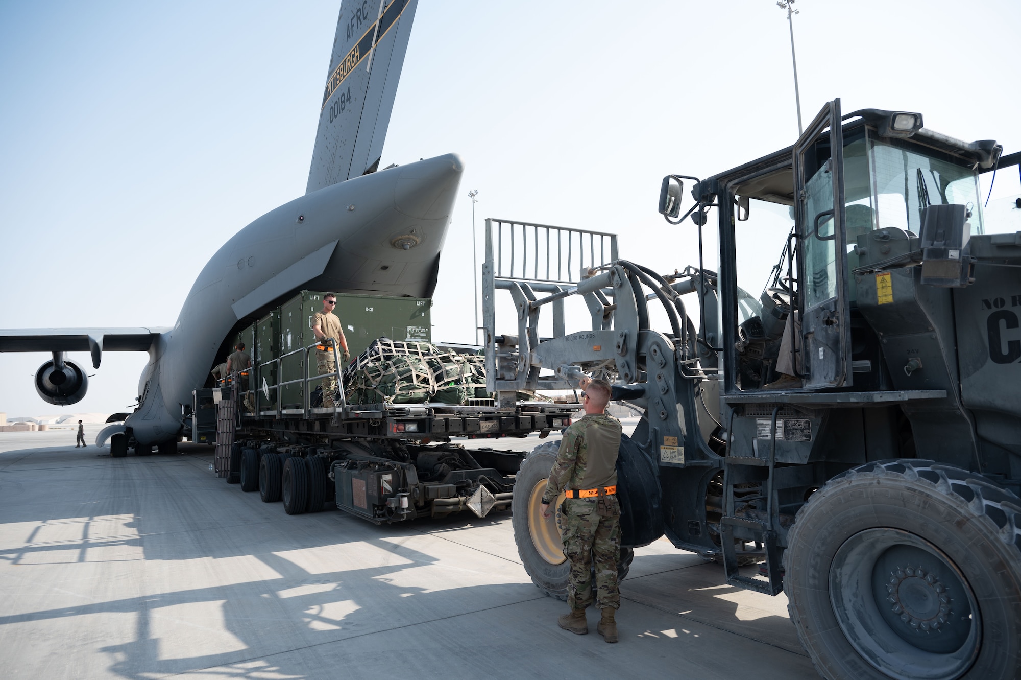 U.S. Air Force Airmen assigned to the 379th Expeditionary Air Base Group load equipment during a rapid aircraft departure within the U.S. Central Command area of responsibility June 15, 2025. Rapid aircraft departures are used to increase the survivability of personnel and airframes. (U.S. Air Force photo by Senior Airman Dieondiere Jefferies)
