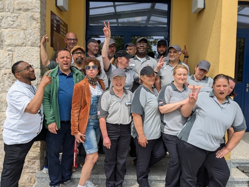 : The team of dining facility assistants from Logistics Readiness Center Ansbach pose for a photo at the Wings of Victory Warrior Restaurant on Katterbach Army Airfield, U.S. Army Garrison Ansbach. The team of FSAs are responsible for the overall cleanliness and sanitation of the facility, seven days a week, 365 days a year. (U.S. Army courtesy photo)