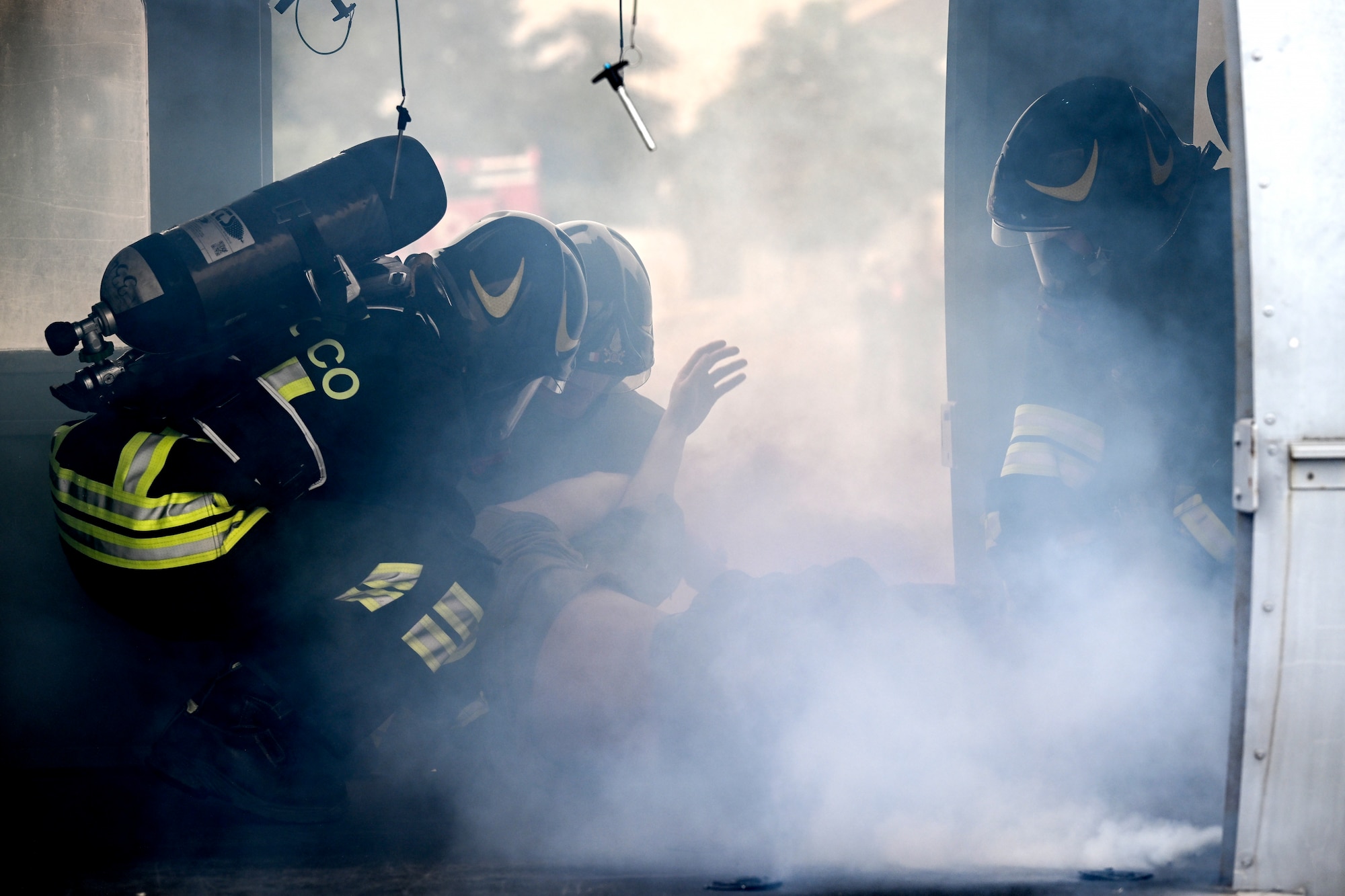Italian firefighters rescue a victim from a simulated aircraft crash.