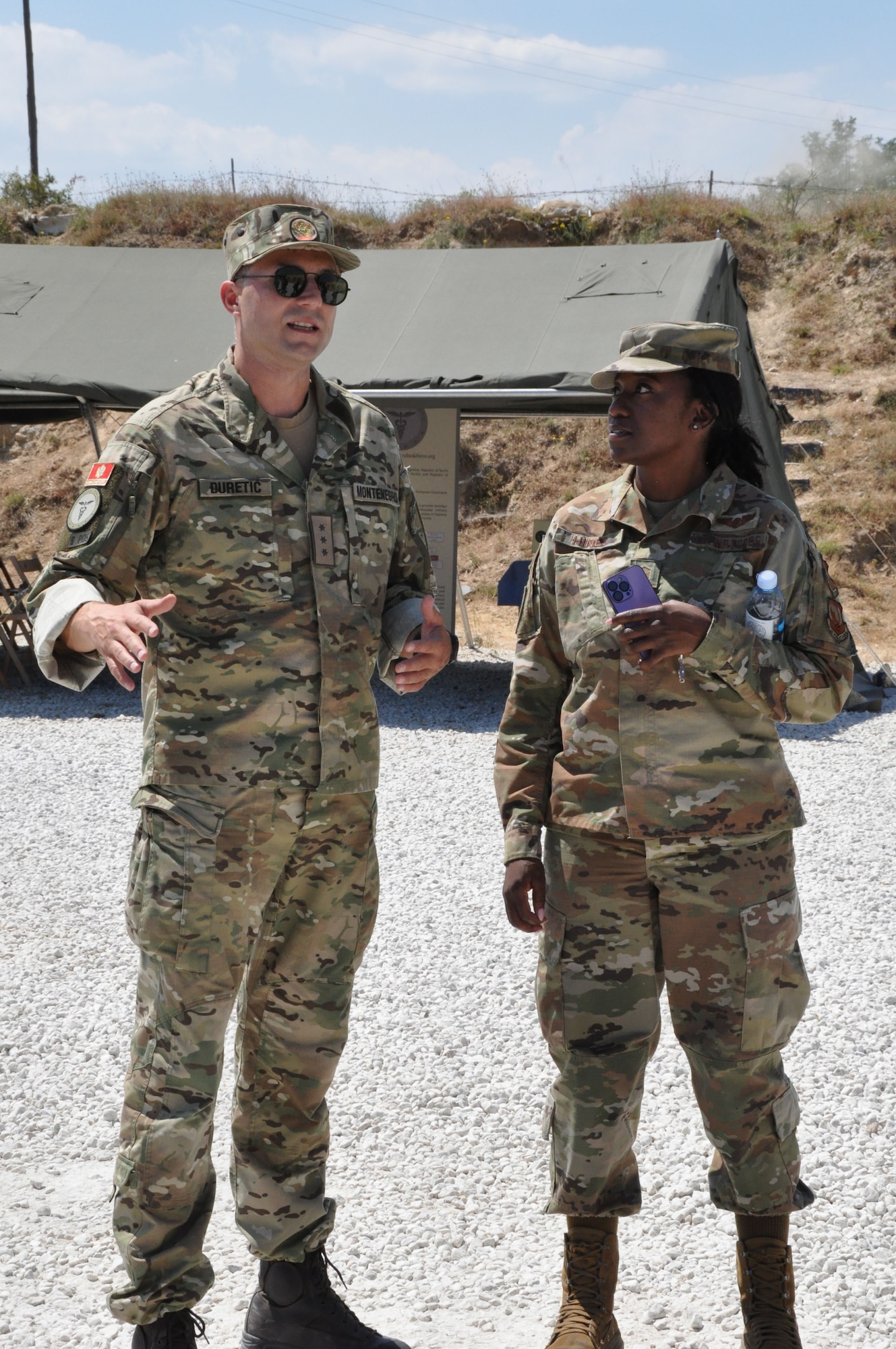 A man and a women standing next to each other.