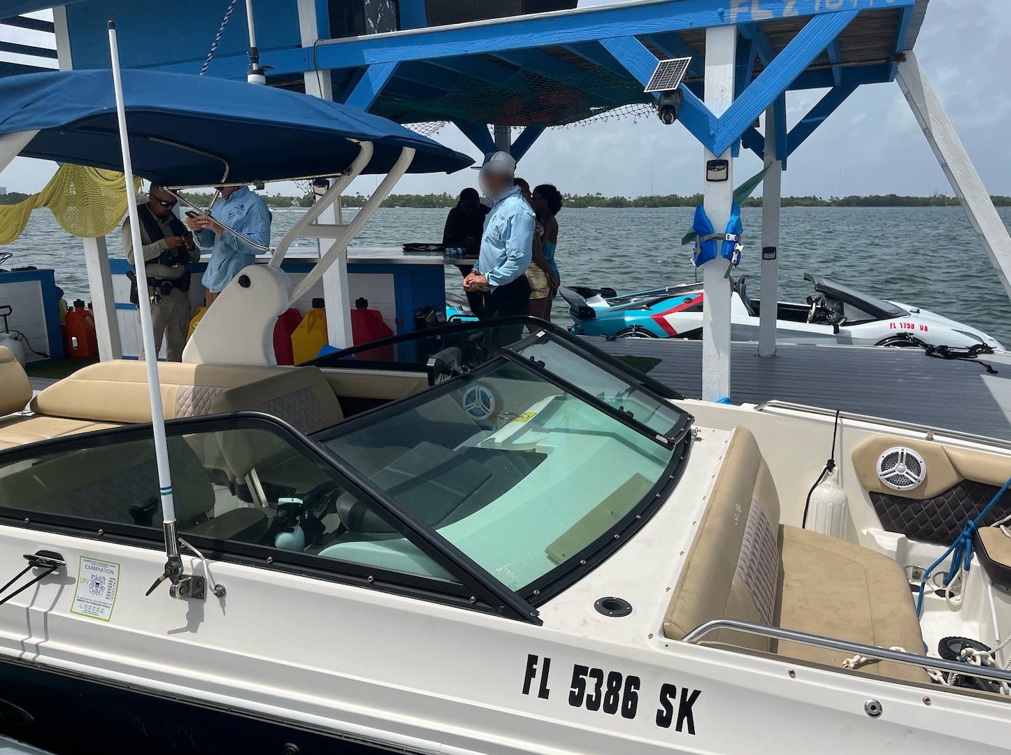 A Coast Guard boarding team inspects a charter vessel