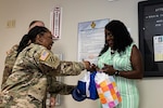 Ms. Samantha Warford wins Kenner Army Health Clinic's Mental Health Awareness Month Scavenger Hunt.