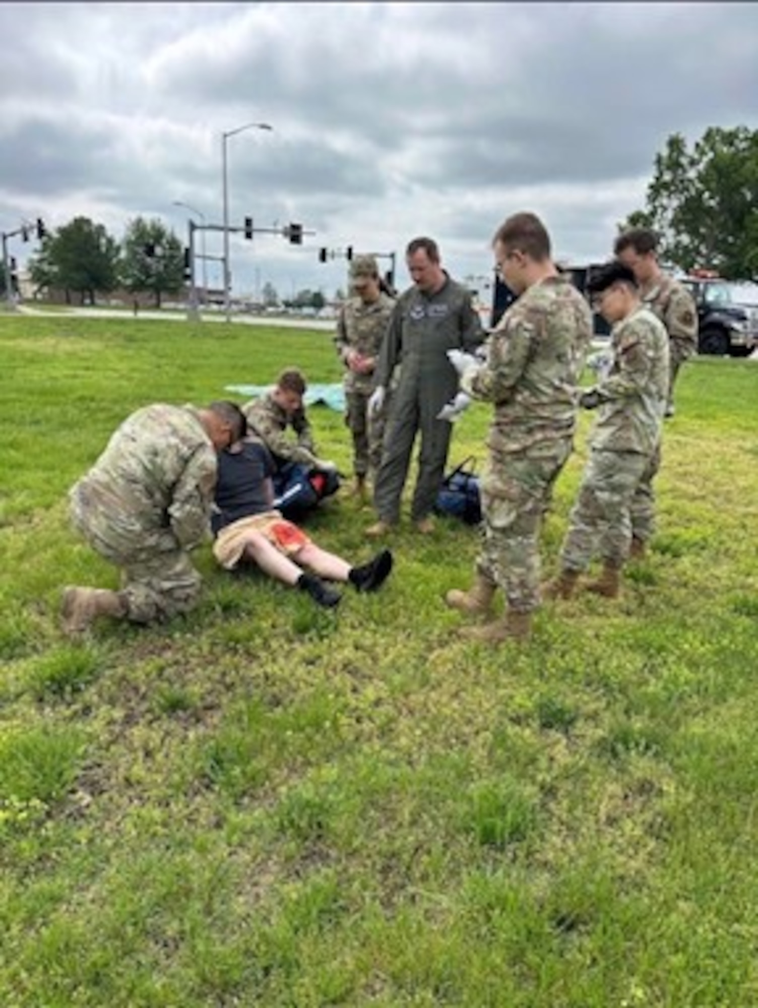 Members of the 509th Medical Group, Whiteman Air Force Base, Mo., participate in a field readiness training evolution under the watchful eye of  Dr. Van Uitert, aeromedical provider. Whiteman leadership rolled out the “Five in Four” initiative—a flexible four-day workweek model that maintains 40-hour workweeks while enhancing access to care and improving the quality of life for healthcare professionals.