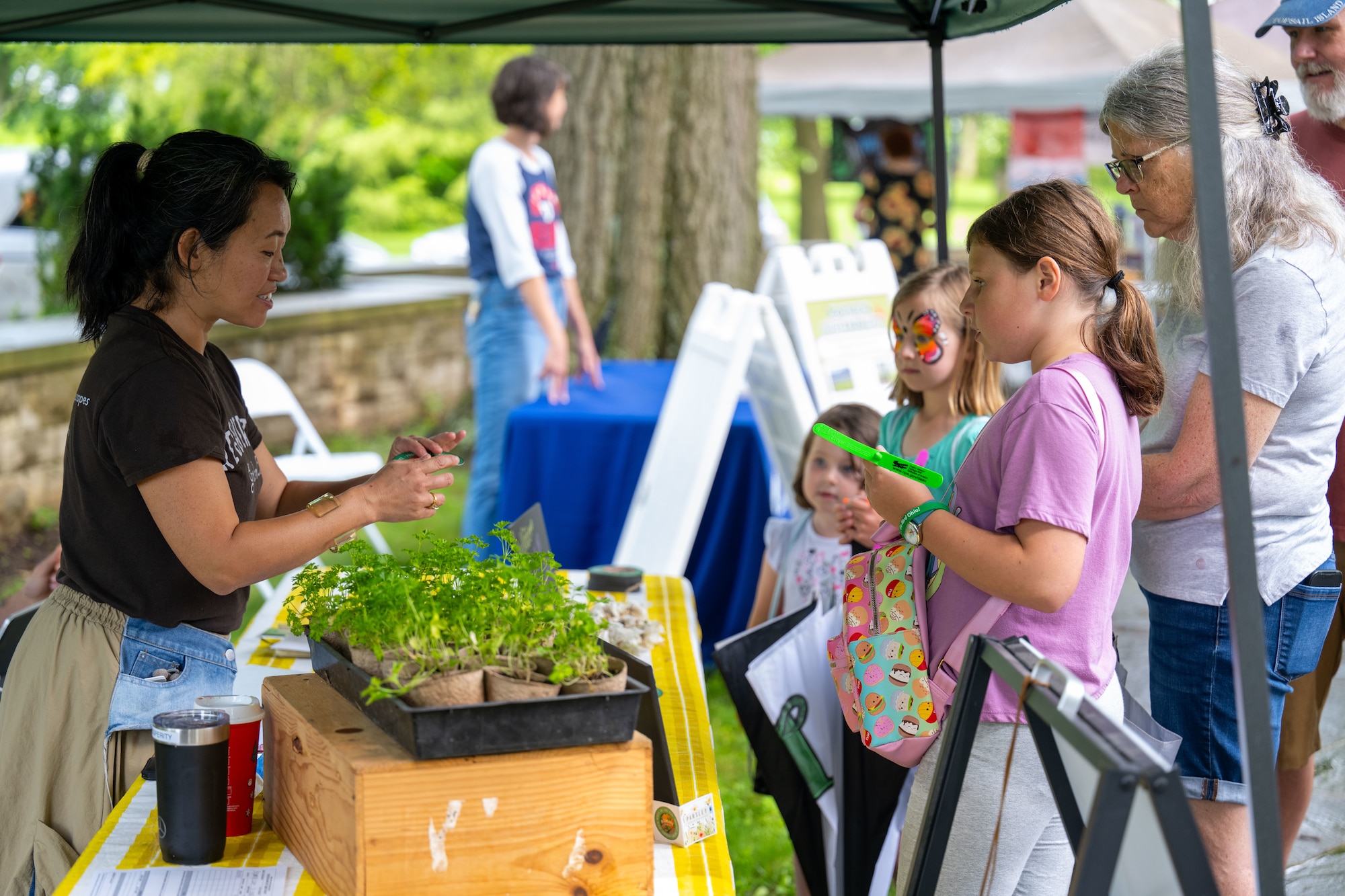 A member of the 88th Civil Engineer Group’s Environmental Branch greets guests attending the Pollinator Expo June 18, 2025, at the Wright Brothers Memorial, Dayton, Ohio. This is the fifth year of the Pollinator Expo which was started to bring awareness about the decline of pollinator populations. (U.S. Air Force photo by Jack Gardner)