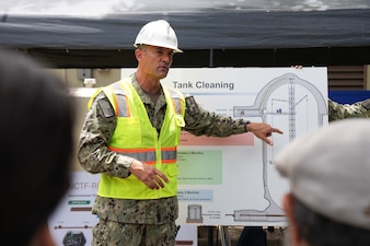 Rear Adm. Marc Williams, deputy commander, Navy Closure Task Force-Red Hill (NCTF-RH), speaks with visitors from the National Academies of Sciences, Engineering, and Medicine during a site visit to the Red Hill Bulk Fuel Storage Facility (RHBFSF) in Honolulu, June 24, 2025. Charged with the safe decommissioning of the facility, NCTF-RH was established by the Department of the Navy as a commitment to the community and the environment. NCTF-RH continues to engage with the people of Hawaii, regulatory agencies, and other stakeholders as it safely and deliberately decommissions the RHBFSF. (U.S. Navy photo by Mass Communication Specialist 1st Class Glenn Slaughter)