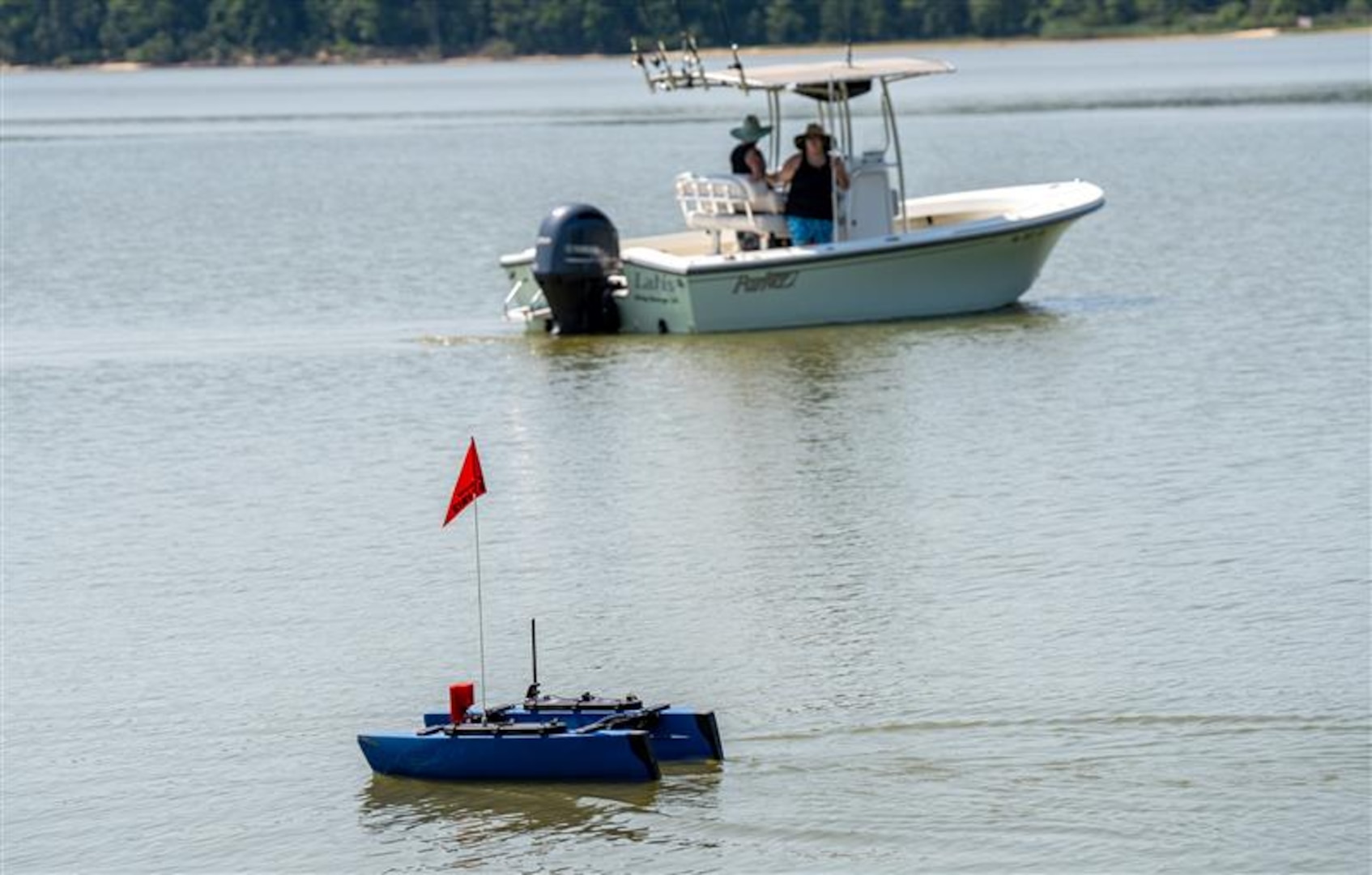 DAHLGREN, Va. – A team’s autonomous BlueBoat zeroes in on a research vessel serving as the mission’s target of interest. The mission was the main event for a Workforce Development Innovation Challenge to develop a small, unmanned vessel with commercially available software and hardware to conduct autonomous intelligence, surveillance and reconnaissance missions on the water. (Dave Ellis/NSWCDD Photo)