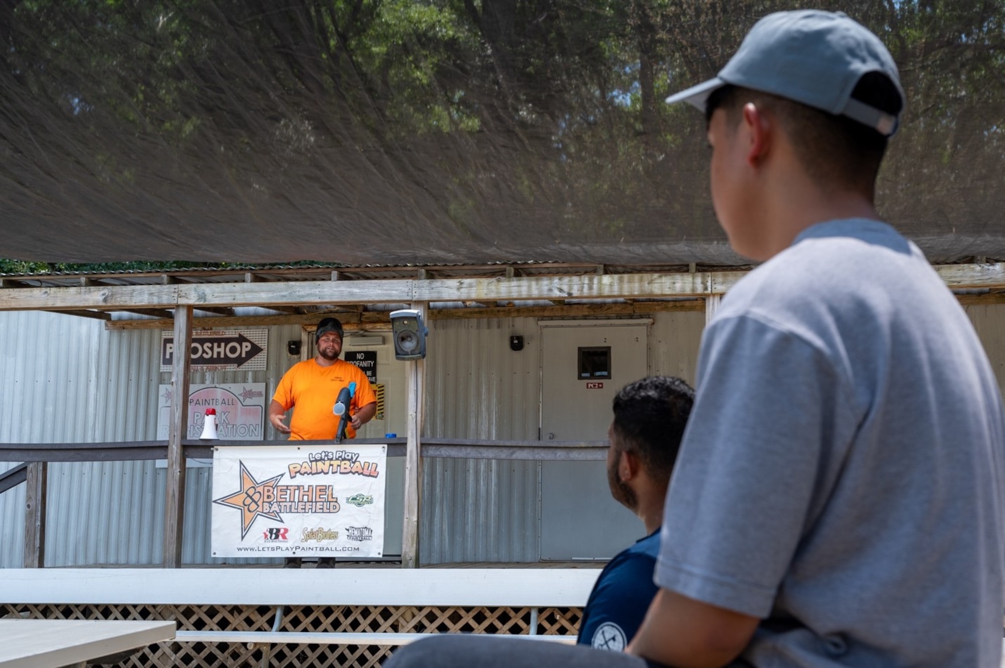 A man gives an equipment tutorial to Airmen. (U.S. Air Force photo by Airman 1st Class Donnell Ramsey)