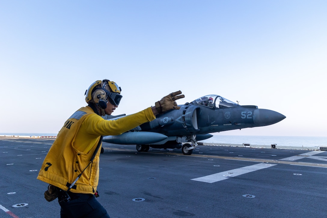A U.S. Marine Corps AV-8B Harrier with Marine Medium Tiltrotor Squadron 263 (Reinforced), 22nd Marine Expeditionary Unit (Special Operations Capable), prepares for takeoff during flight operations aboard the Wasp-class amphibious assault ship USS Iwo Jima (LHD 7), in support of Composite Training Unit Exercise while underway in the Atlantic Ocean, June 24, 2025. During COMPTUEX, the IWO ARG and 22nd MEU(SOC), refine tactics, techniques, and procedures to execute warfighting functions that enhance operational readiness and lethality as a unified IWOARG/22MEU(SOC) team. (U.S. Marine Corps photo by Cpl. Sharon Errisuriz)