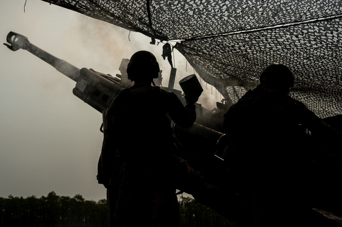 U.S. Marines with Golf Battery, Battalion Landing Team 3/6, 22nd Marine Expeditionary Unit (Special Operations Capable), operate an M777 Howitzer during a live-fire range on Camp Lejeune, North Carolina, June 4, 2025. Golf Battery conducted its live fire sustainment training to enhance tactical proficiency and maintain its high level of readiness in preparation of the 22nd MEU (SOC)’s upcoming deployment.  (U.S. Marine Corps photo by Lance Cpl. Kyle Baskin)