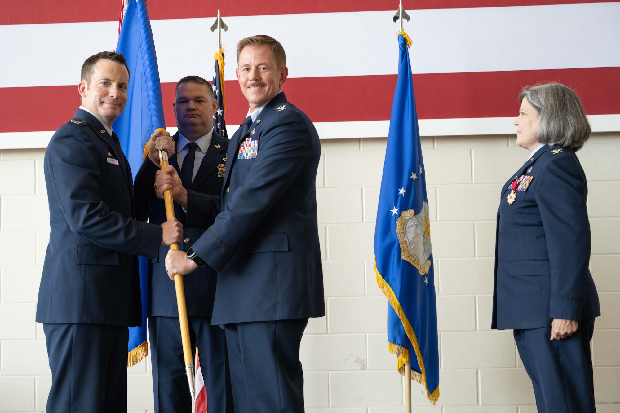 Col. Jason Purcell assumes command of the 317th Maintenance Group from Col. Justin Diehl 317th Airlift Wing commander, during a change of command ceremony at Dyess Air Force Base, Texas, June 27, 2025. Col. Jason Purcell assumed command of the 317th MXG, responsible for keeping Dyess’ C-130J Super Hercules fleet fully mission capable. (U.S. Air Force photo by Airman Caleb Schellenberg)