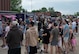 Airmen and their families gather at Freedom Fest for food and community at Minot Air Force Base, North Dakota, June 27, 2025. Airmen and their families enjoyed an evening filled with meals from food vendors, music and a fireworks display that fostered a connection with the community. (U.S. Air Force photo by Airman 1st Class Wesley Davies)