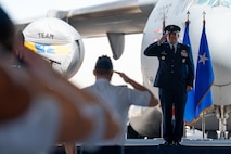 A photo of an Airman saluting.