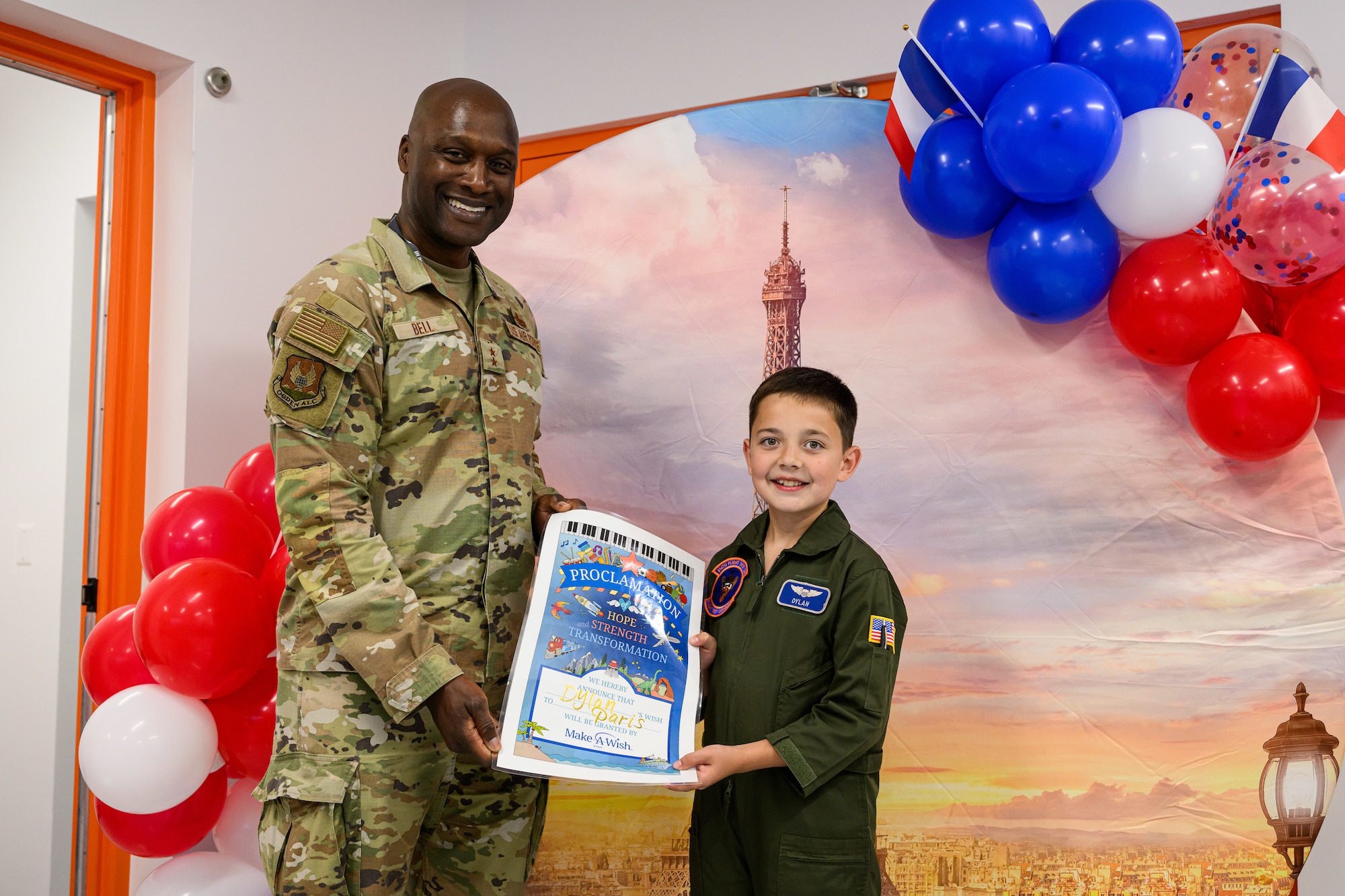 Dylan and Maj. Gen. Bell pose with the proclamation.