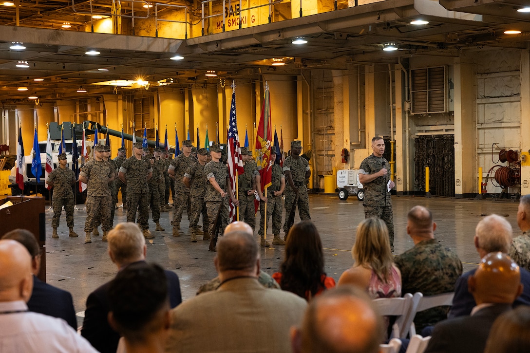U.S. Marine Corps Maj. Gen. Keith Reventlow, commanding general of Marine Corps Logistics Command, presides over a change of command ceremony July 2 at Marine Corps Support Facility Blount Island in Florida. Col. Luke Watson, who had served as commanding officer of Blount Island Command since Aug. 11, 2023, relinquished command to Col. David Merles while aboard the USNS Sgt. William W. Seay, a U.S. Navy maritime prepositioning ship. The facility is the hub of the Marine Corps’ prepositioning programs. Blount Island Command supports Marine expeditionary forces worldwide during military exercises and contingency operations, from combat to humanitarian. (Official U.S. Marine Corps Photo/Dustin Senger)