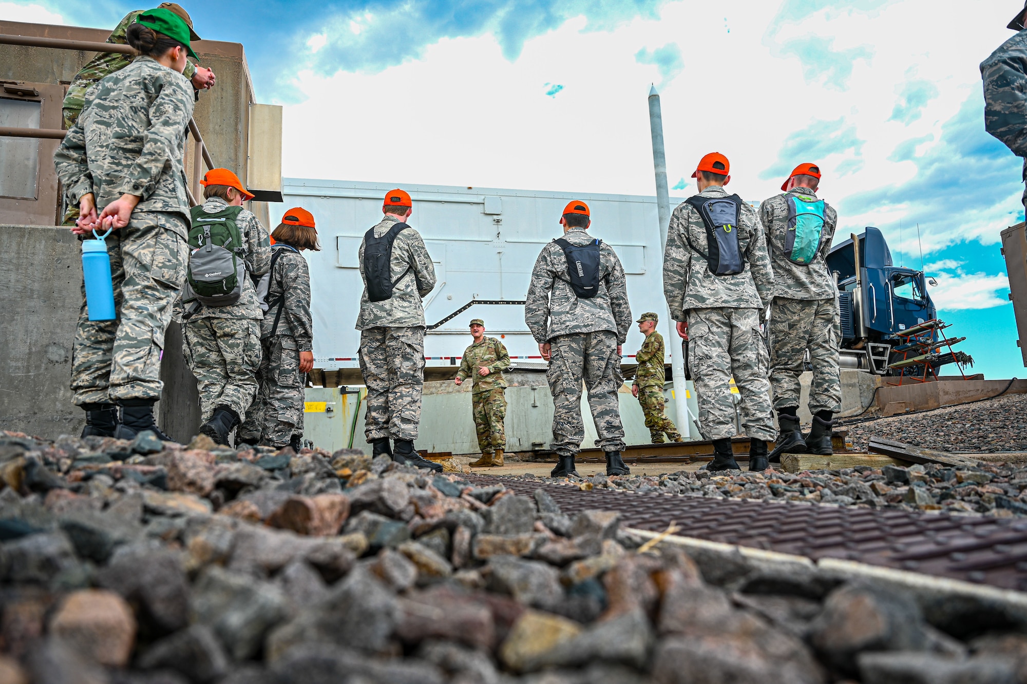 CAP cadets receiving brief at launcher closure door on U-01