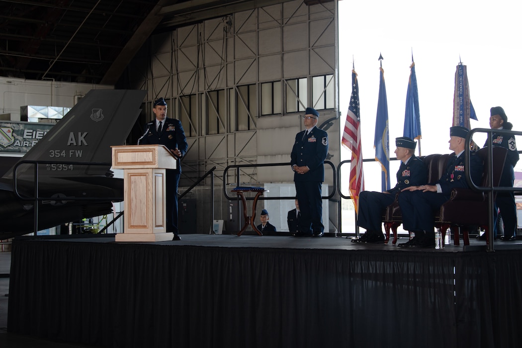 U.S. Air Force Col. Matthew Johnston, 354th Fighter Wing incoming commander, addresses the 354th FW for the first time during the 354th FW Change of Command ceremony at Eielson Air Force Base, Alaska, July 2, 2025.