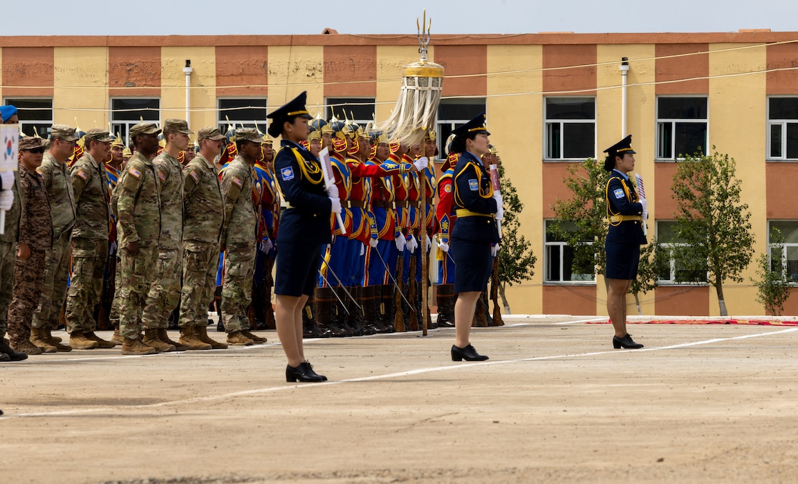 Multinational soldiers stand in formation during the closing ceremony of Khaan Quest 2025, on June 28, 2025, at Five Hills Training Area. Kh