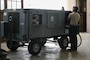 Airman using a load bank to test a generator.