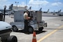 Airman testing generator on flightline.