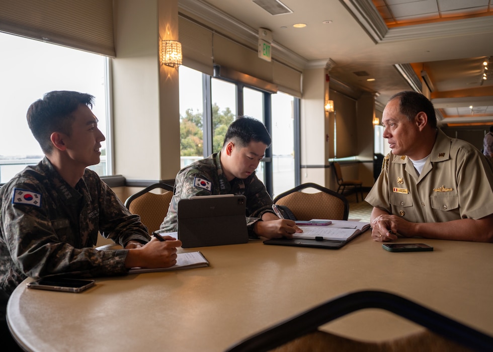 Members of the Surface Warfare Planning Group collaborate during the RIMPAC 2026 Initial Planning Conference held at Admiral Kidd Catering & Conference Center in San Diego, June 25, 2025.