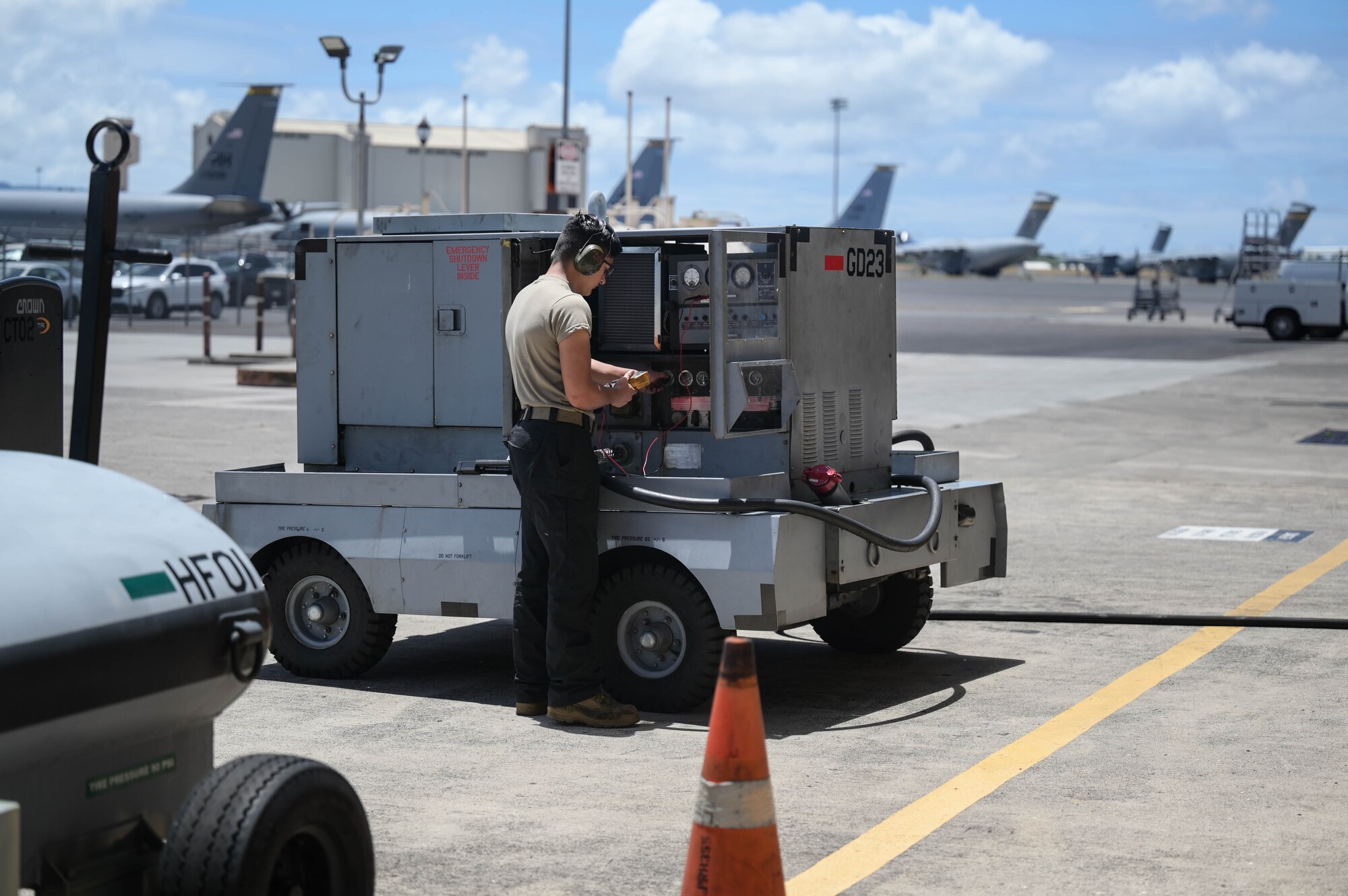 Airman testing generator on flightline.