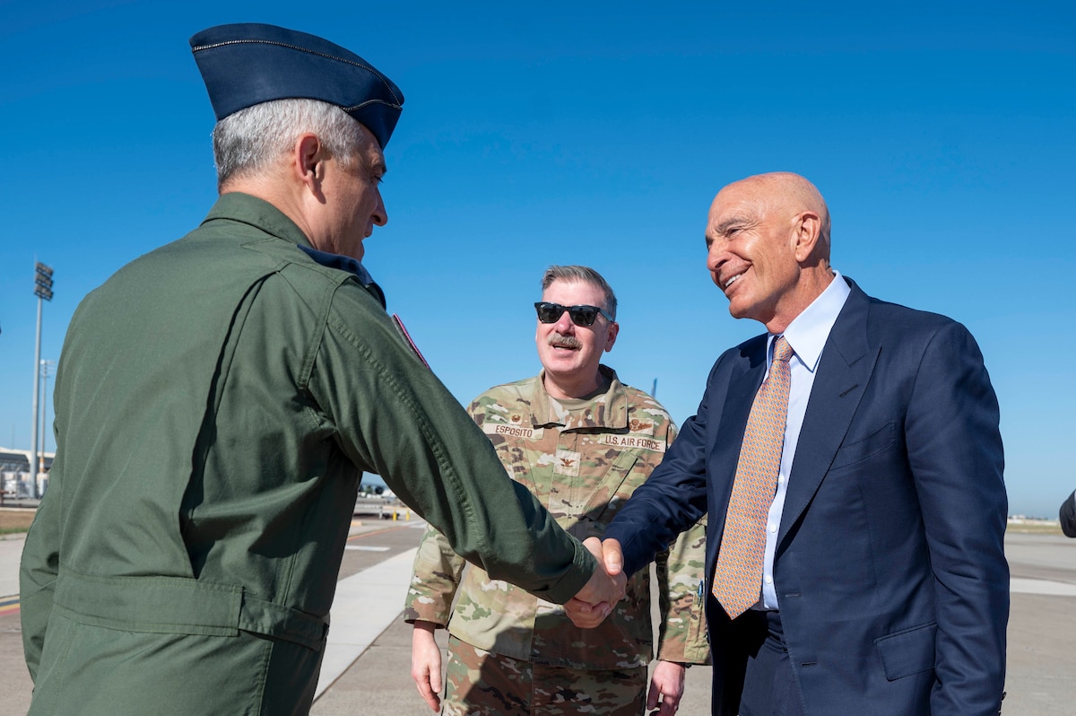 Ambassador Thomas Barrack, right, U.S. Ambassador to Türkiye, is greeted by a 10th Main Jet Base Command senior leader during a distinguished visitor tour at Incirlik Air Base, Türkiye, July 1, 2025. On his first visit to Incirlik Air Base, Barrack received a wing mission brief, toured key areas of the installation, and recognized U.S. personnel for their support to the mission, emphasizing the importance of continued cooperation between U.S. and Turkish counterparts in advancing regional stability. (U.S. Air Force photo by Staff Sgt. Koby I. Saunders)