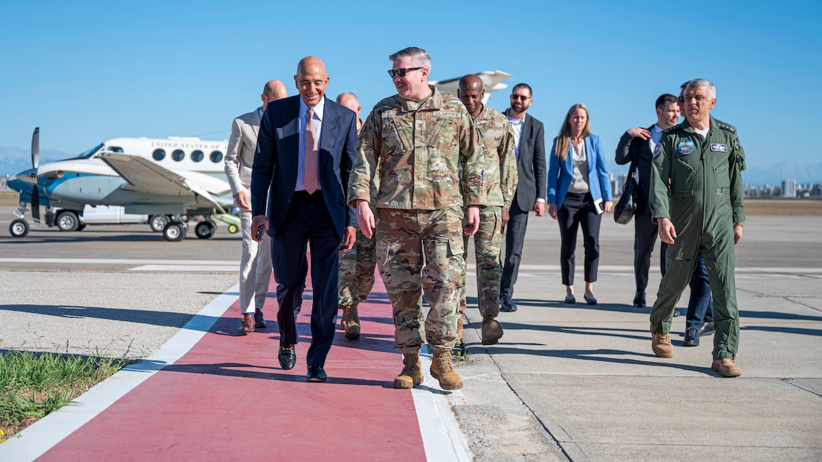 Ambassador Thomas Barrack, left, U.S. Ambassador to Türkiye, is escorted by U.S. Air Force Col. Mike Esposito, 39th Air Base Wing commander, during a distinguished visitor tour at Incirlik Air Base, Türkiye, July 1, 2025. On his first visit to Incirlik Air Base, Barrack received a wing mission brief, toured key areas of the installation, and recognized U.S. personnel for their support to the mission, emphasizing the importance of continued cooperation between U.S. and Turkish counterparts in advancing regional stability. (U.S. Air Force photo by Staff Sgt. Koby I. Saunders)