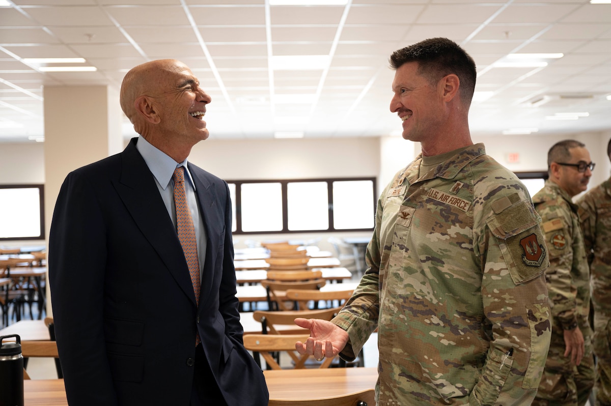 Ambassador Thomas Barrack, U.S. Ambassador to Türkiye, speaks to Col. Craig Rhyne, 39th Medical Group commander, during a distinguished visitor tour at Incirlik Air Base, Türkiye, July 1, 2025. On his first visit to Incirlik Air Base, Barrack received a wing mission brief, toured key areas of the installation, and recognized U.S. personnel for their support to the mission, emphasizing the importance of continued cooperation between U.S. and Turkish counterparts in advancing regional stability. (U.S. Air Force photo by Staff Sgt. Koby I. Saunders)
