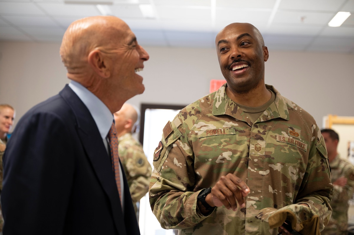 U.S. Air Force Master Sgt. Matthew Powell, chief of protocol assigned to the 39th Air Base Wing, speaks to Ambassador Thomas Barrack, U.S. Ambassador to Türkiye, during a distinguished visitor tour at Incirlik Air Base, Türkiye, July 1, 2025. On his first visit to Incirlik Air Base, Barrack received a wing mission brief, toured key areas of the installation, and recognized U.S. personnel for their support to the mission, emphasizing the importance of continued cooperation between U.S. and Turkish counterparts in advancing regional stability. (U.S. Air Force photo by Staff Sgt. Koby I. Saunders)