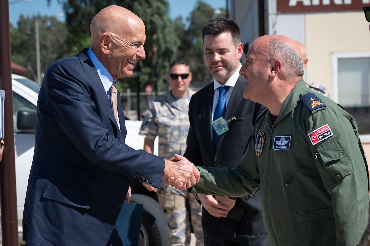 Ambassador Thomas Barrack, U.S. Ambassador to Türkiye, shakes hands with Turkish Air Force Brig. Gen. Kemal Gulec, 10th Main Jet Base Command commander, after a distinguished visitor tour at Incirlik Air Base, Türkiye, July 1, 2025. On his first visit to Incirlik Air Base, Barrack received a wing mission brief, toured key areas of the installation, and recognized U.S. personnel for their support to the mission, emphasizing the importance of continued cooperation between U.S. and Turkish counterparts in advancing regional stability. (U.S. Air Force photo by Staff Sgt. Koby I. Saunders)