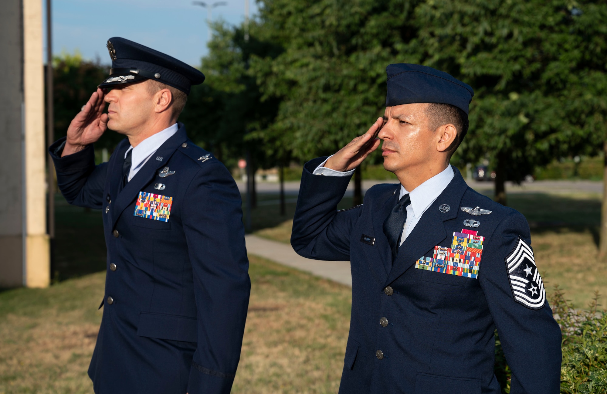 Airmen saluting