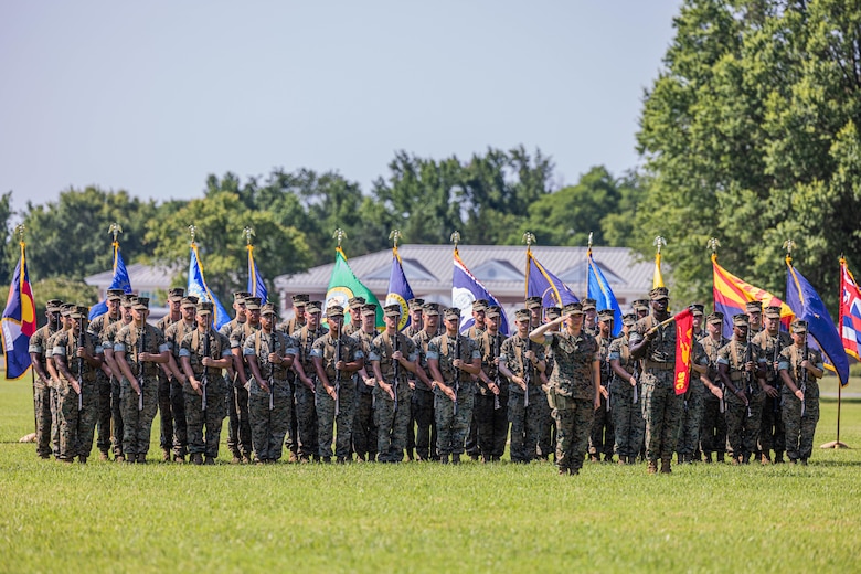U.S. Marines present arms for the Security Battalion change of command ceremony on Marine Corps Base Quantico, Virginia, June 26, 2025. During the ceremony Lt. Col. Gerard W. Vanderwaal was relieved in his duties as commander of Security Battalion by Lt. Col. Denver M. Edick. (U.S. Marine Corps photo by Sgt. Chancellor Reynolds)
