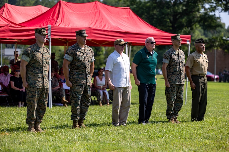 Former commanding officers for Security Battalion, both active and retired, stand at attention during the Security Battalion change of command ceremony on Marine Corps Base Quantico, Virginia, June 26, 2025. During the ceremony Lt. Col. Gerard W. Vanderwaal was relieved in his duties as commander of Security Battalion by Lt. Col. Denver M. Edick. (U.S. Marine Corps photo by Sgt. Chancellor Reynolds)