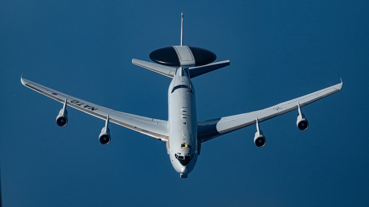 A NATO E-3 Sentry approaches a KC-135 Stratotanker from the 100th Air Refueling Wing during an aerial refueling mission over Spain, July 2, 2025.