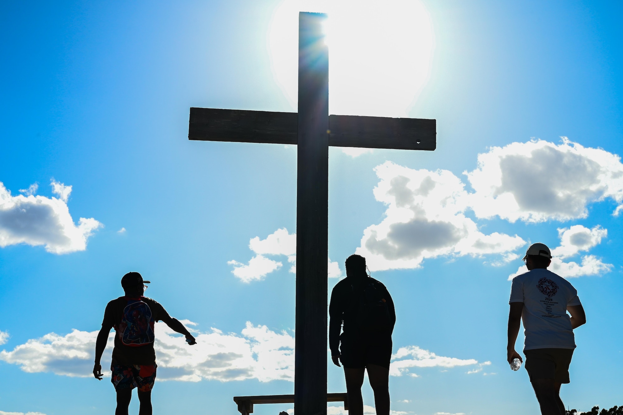 U.S. Air Force Airmen from Dyess Air Force Base hike during a resiliency retreat at Camp Butman, Texas, June 21, 2025. Spiritual resiliency is a key component of the Air Force’s Comprehensive Airman Fitness Program. (U.S. Air Force photo by Airman 1st Class Adrien Tran)
