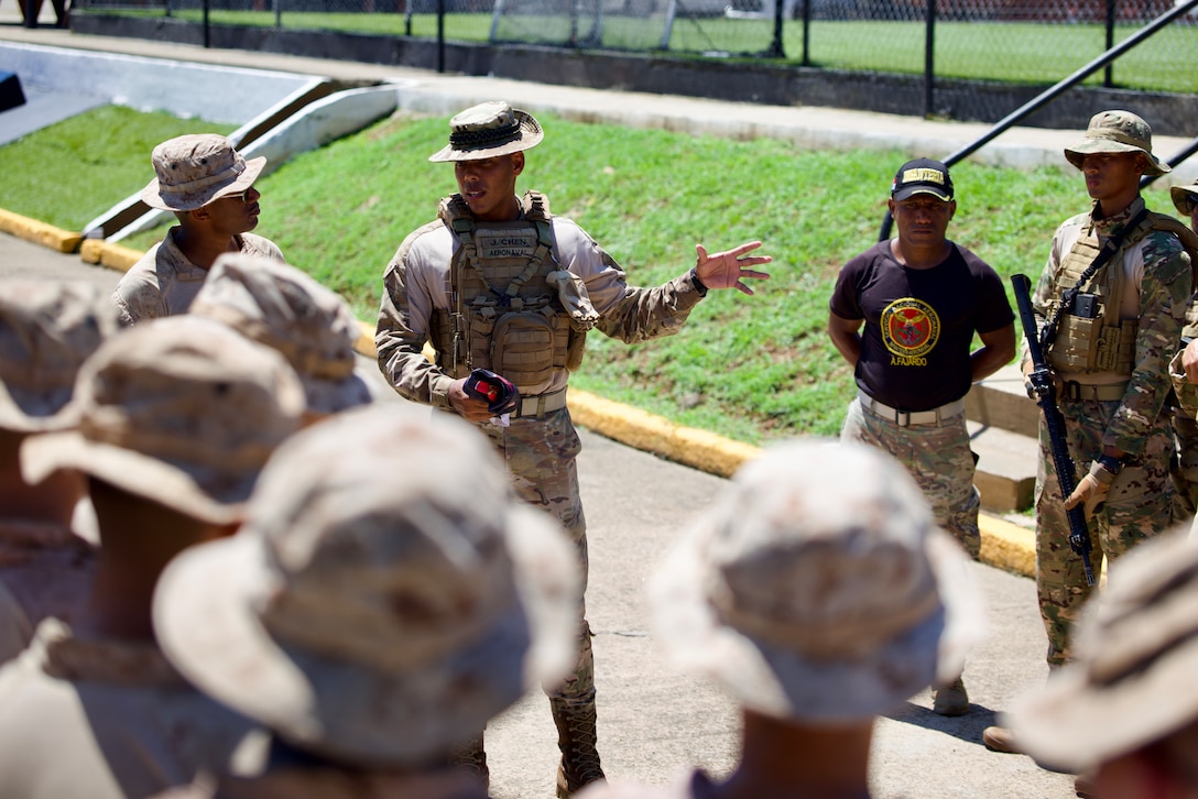 National Aeronaval Service of Panama Lt. Jesús Chen, center, expresses his gratitude to the Marines with 2nd Battalion, 2nd Marine Regiment at the conclusion of the second training iteration in Panama, June 26, 2025. The Marines and Panama’s forces spent several weeks training together on topics such as live-fire, medical care, jungle training and survival, and land navigation tactics. (U.S. Marine Corps photo by Sgt. Samuel Qin)