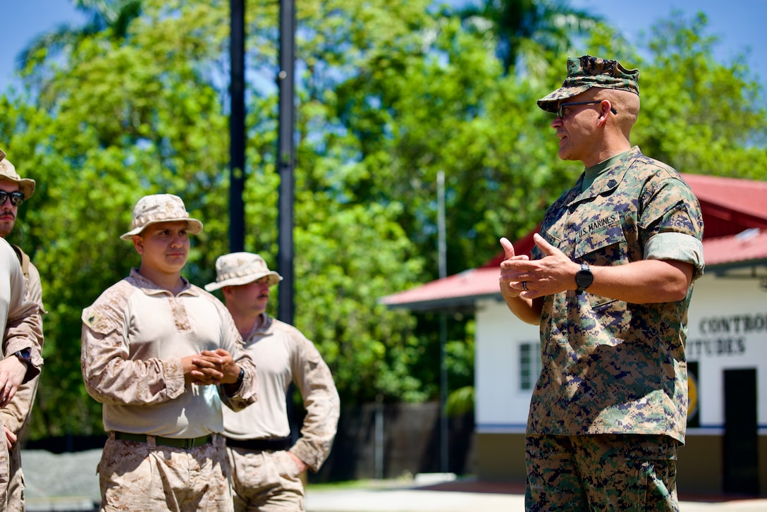 U.S. Marine Corps Sgt. Maj. Rafael Rodriguez, right, command senior enlisted leader, U.S. Southern Command, expresses gratitude to the Marines with 2nd Battalion, 2nd Marine Regiment during the second training iteration with the National Aeronaval Service of Panama in Panama, June 26, 2025. The Marines and Panama’s forces spent several weeks training together on topics such as live-fire, medical care, jungle training and survival, and land navigation tactics. (U.S. Marine Corps photo by Sgt. Samuel Qin)