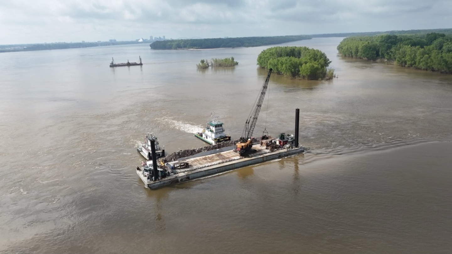 Project Manager Zach Cook, and his dedicated Project Delivery Team secured the win on the FY25 Dike Stone Repair Project by balancing the constraints of safety, time, budget, and quality, creating value for our partners, stakeholders, and the American taxpayer. 

This important $2.9 million Mississippi River channel maintenance project placed 82k tons of Graded Stone A to repair and restore multiple dikes to “As-Built” conditions at Sycamore Chute, Tennessee. 

Dikes assist in maintaining the navigation channel by helping to promote scouring of the riverbed during low water. Dikes are most effective during low water periods and are considering the more permanent solution in maintaining navigation as opposed to repetitive maintenance dredging.

The area of the project dikes was the most dredged spot within the Memphis District area of responsibility during the last three low-water seasons. The dike repair project minimizes the future need for dredging this location. (Courtesy Photo)