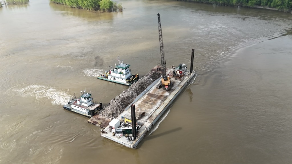 Project Manager Zach Cook, and his dedicated Project Delivery Team secured the win on the FY25 Dike Stone Repair Project by balancing the constraints of safety, time, budget, and quality, creating value for our partners, stakeholders, and the American taxpayer. 

This important $2.9 million Mississippi River channel maintenance project placed 82k tons of Graded Stone A to repair and restore multiple dikes to “As-Built” conditions at Sycamore Chute, Tennessee. 

Dikes assist in maintaining the navigation channel by helping to promote scouring of the riverbed during low water. Dikes are most effective during low water periods and are considering the more permanent solution in maintaining navigation as opposed to repetitive maintenance dredging.

The area of the project dikes was the most dredged spot within the Memphis District area of responsibility during the last three low-water seasons. The dike repair project minimizes the future need for dredging this location. (Courtesy Photo)