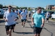 Airmen assigned to the 891st Missile Security Forces squadron run in the Mental Health color run at Minot Air Force Base, North Dakota, June 30, 2025. The Airmen participated in a 1.8 mile run to spread awareness about mental health.